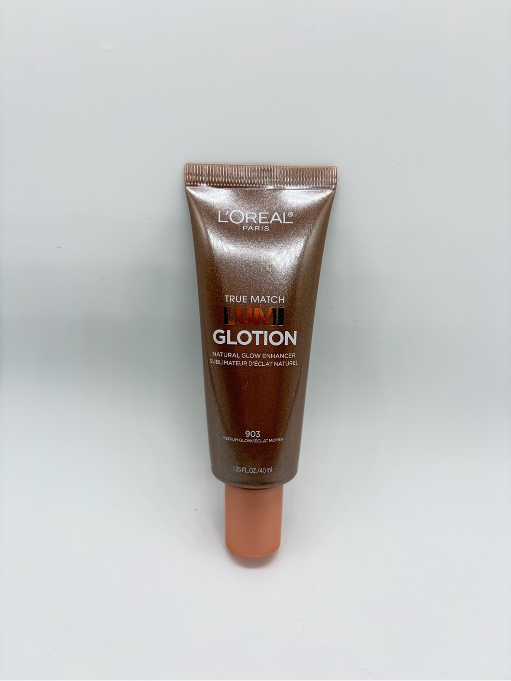 True Match Lumi Glotion Natural Glow Enhancer - Medium - cool undertone